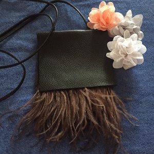 Handmade leather and ostrich feather bag